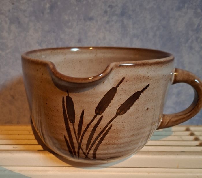 Tasse avec bec verseur