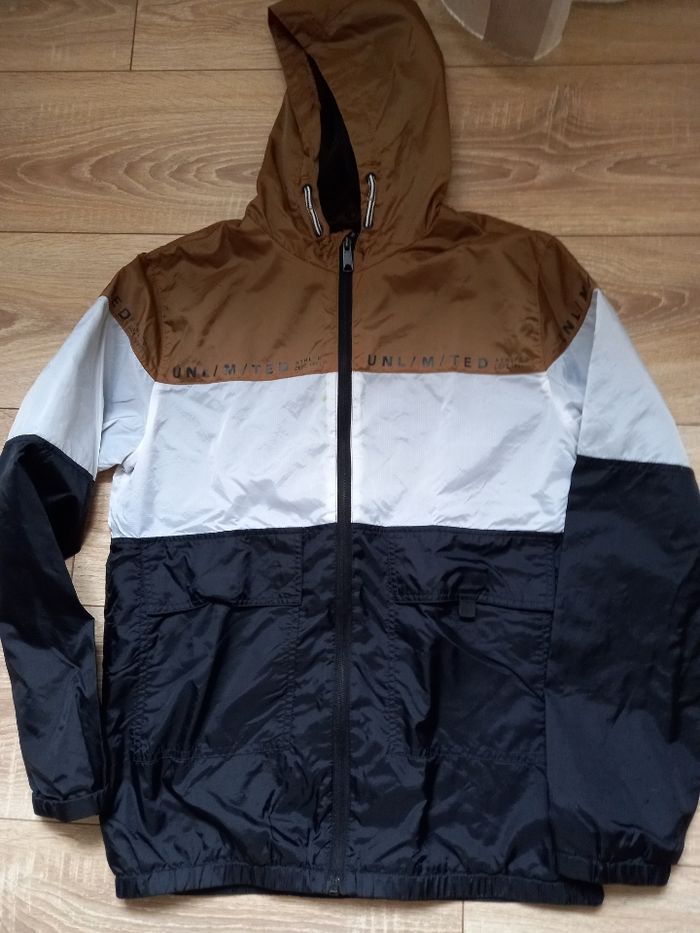 Coupe -vent marron et noir marque Gémo taille 14 ans
