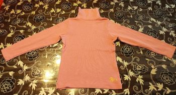 Pull col roulé rose imprimé logo Orchestra
