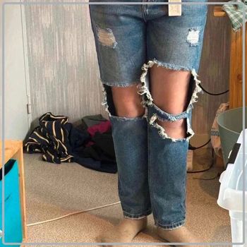 Jeans trouée  taille  42  marque  denim  collection