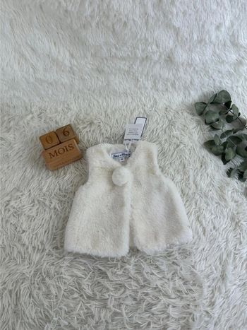 Gilet fausse fourrure nacré blanc tartine et chocolat taille 6 mois