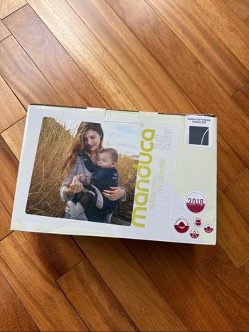 Porte bébé manduca jamais utilisé
