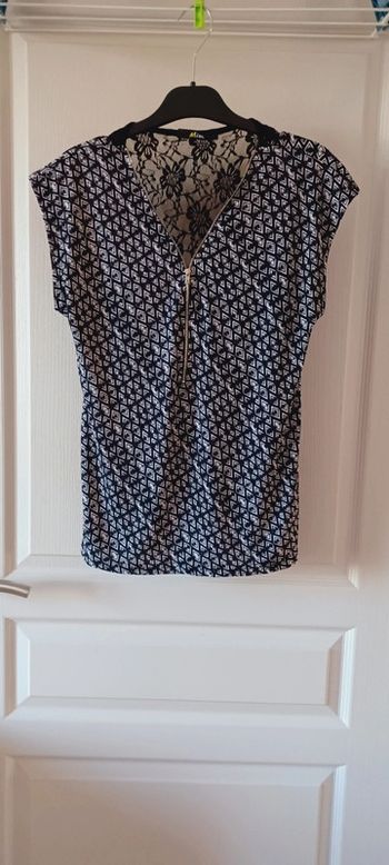 Top femme noir et blanc avec fermeture éclair et dentelle