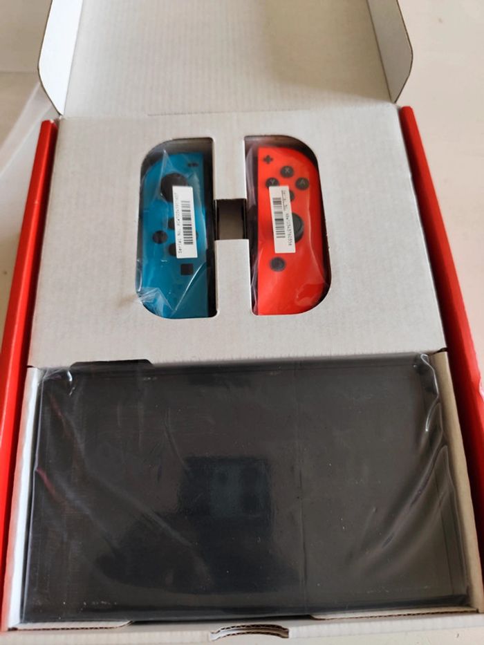 Console Nintendo switch OLED rouge bleu néon garantie - photo numéro 2