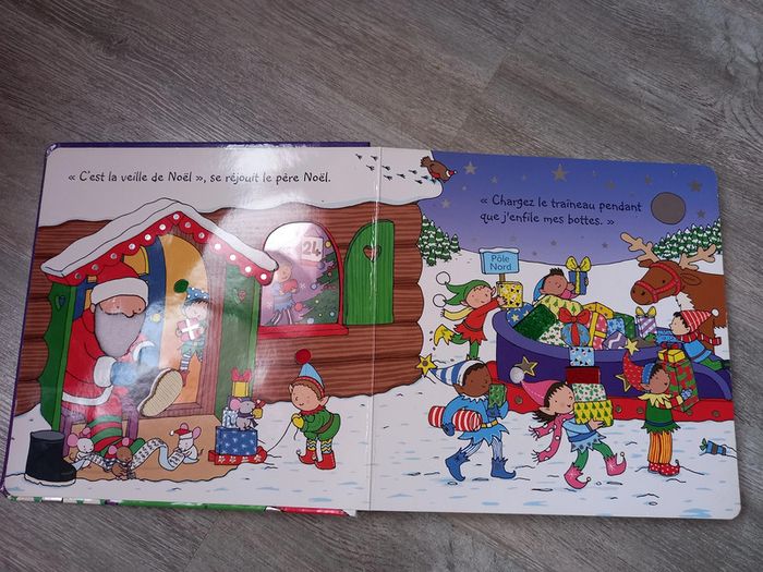livre le père noël cartonné avec matières différentes à toucher - photo numéro 2