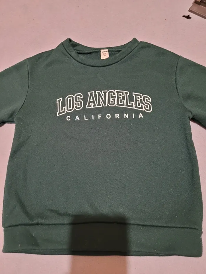 Sweat-shirt taille 7 ans