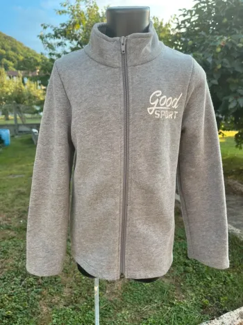 Veste de sport taille 6 ans couleur gris