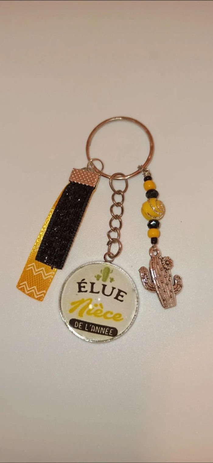 Cadeau Nièce, porte clé message bijoux de sac " élue Nièce de l année "