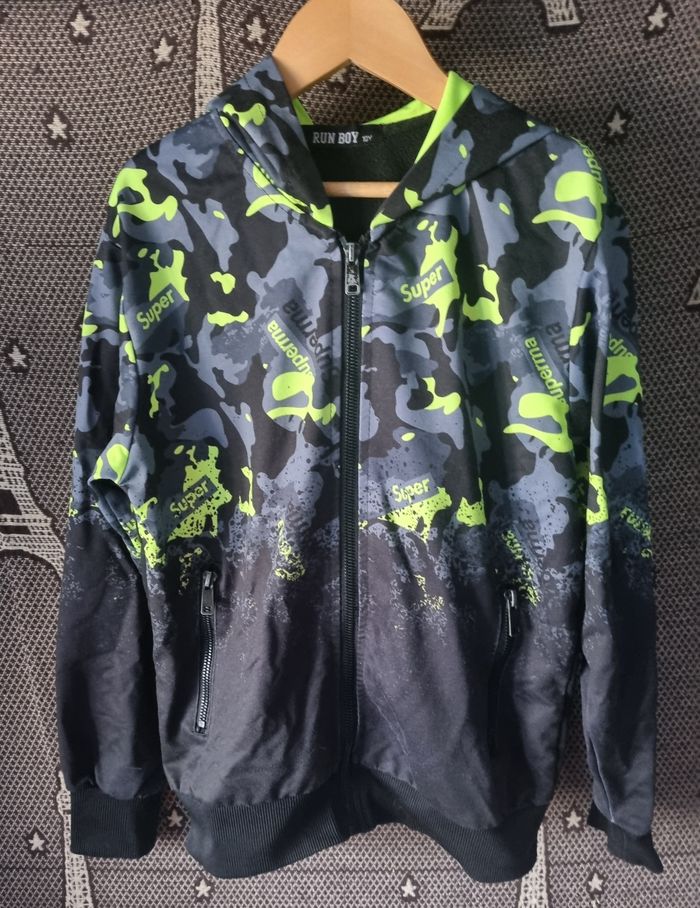 Gilet de sport zippée noir gris et jaune fluo 10ans