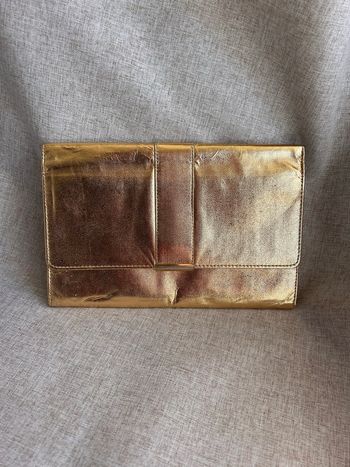 Pochette G. Castellari en cuir doré 