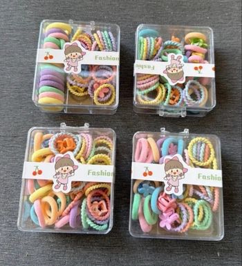 4 petite boîtes de mini élastique 