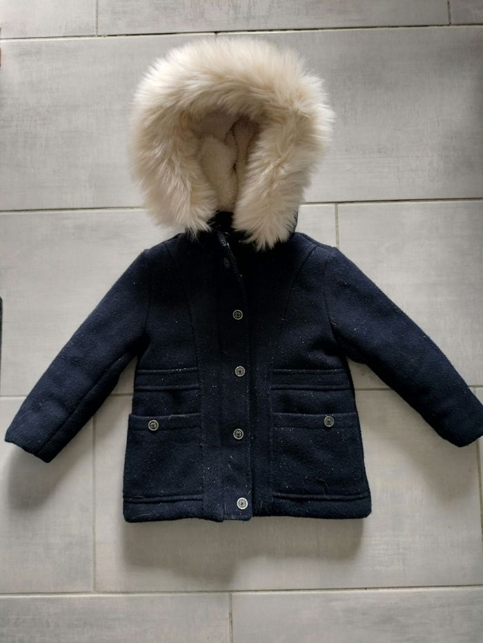 Manteau bleu marine pailleté avec capuche