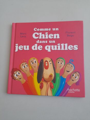 Livre" Comme un chien dans un jeu de quilles"
