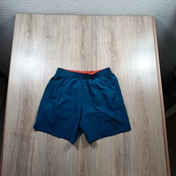 Short gymshark homme bleu M