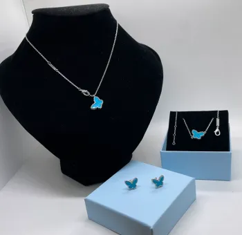 Parure pour femme argenté motif papillon 🦋