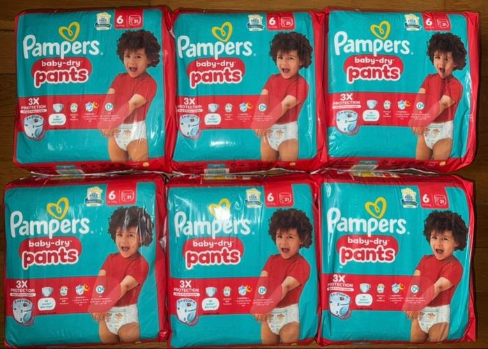 6 paquets de couches Pampers taille 6