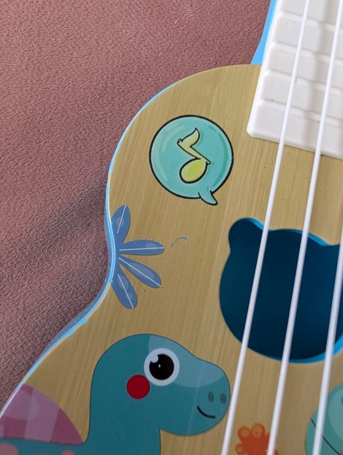 🎸 Mini guitare enfant "Happy Dinosaur"  Très bon état - photo numéro 2