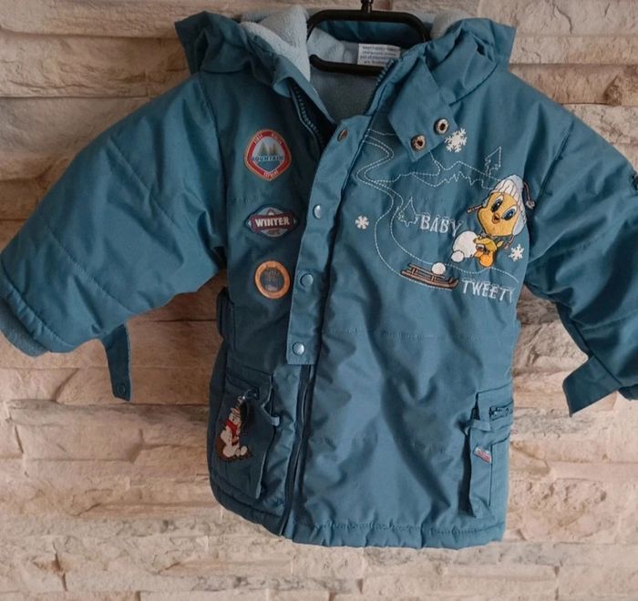 Manteau et gants Looney Tunes taille 6 mois en très bon état