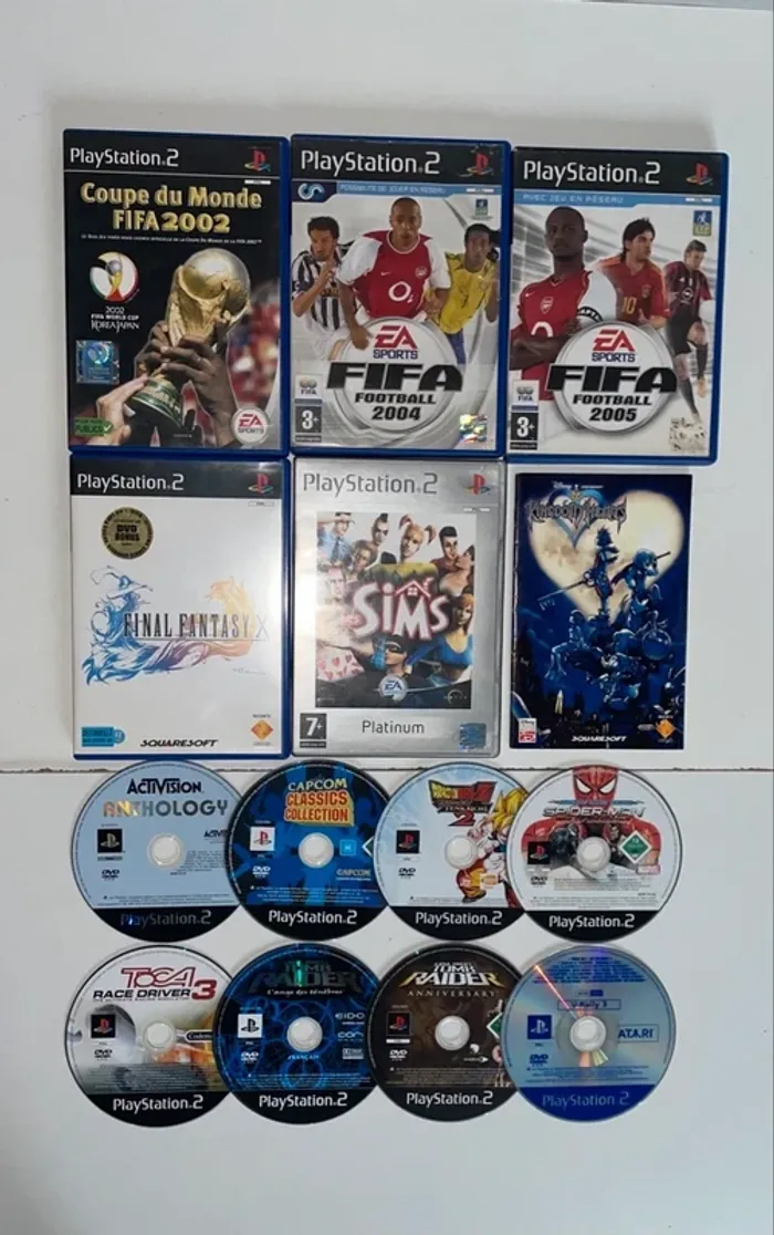lot boites vide, notices + jeux loose Playstation 2
