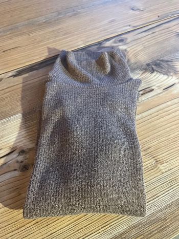 Pull col roulé à paillettes