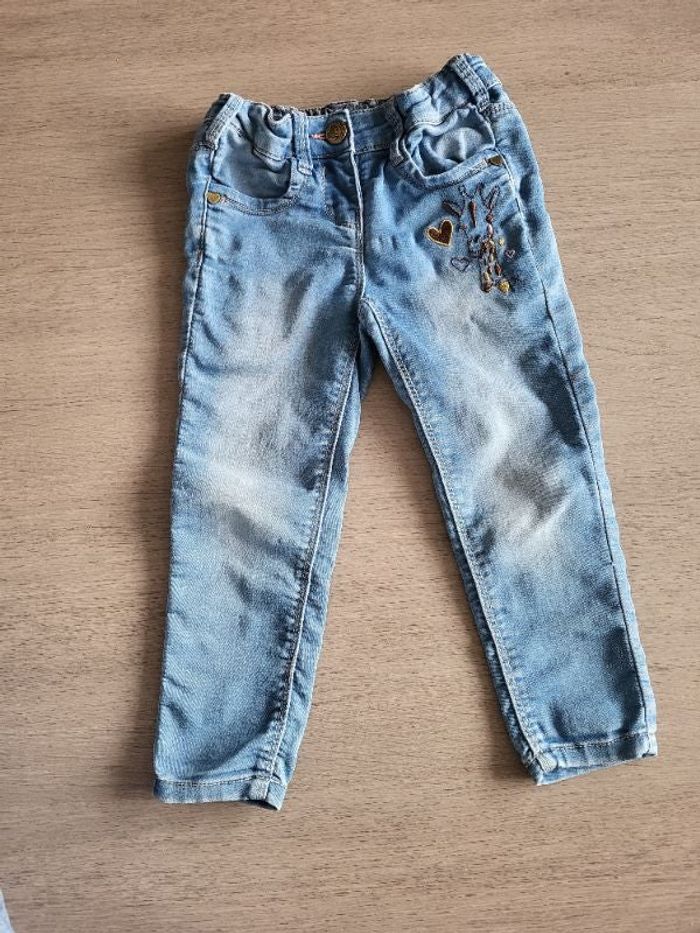 Joli jeans avec bordure girafe