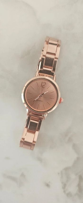 Montre doré rose