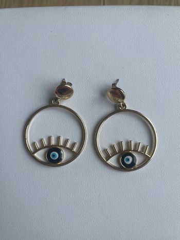 Boucles d’oreilles dorées œil