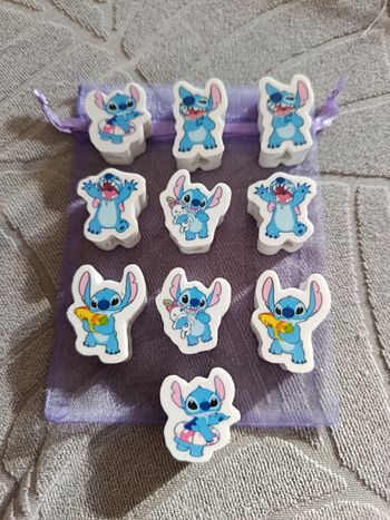 A saisir, NEUVES , lot de 10 gommes " Stitch " ! 
