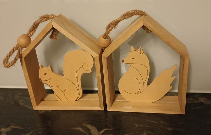Décoration animaux en bois à suspendre