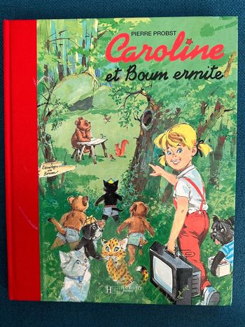 Livre reliure rouge édition limitée Caroline et le Boum Ermite ours bd album Pierre probst