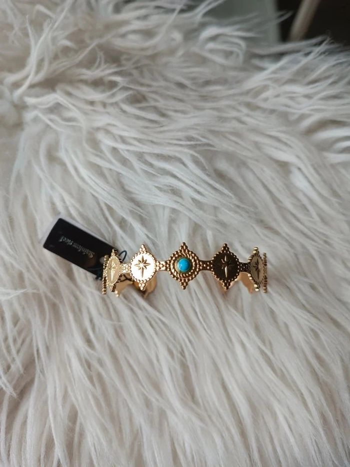 Bracelet jonc doré en acier inoxydable perle bleu Marque Somini Neuf - photo numéro 2