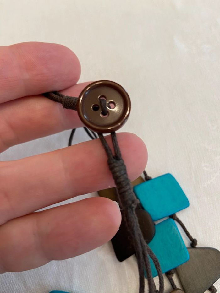 Collier trois rangs en perles de bois plates tons bruns et turquoise neuf - photo numéro 16
