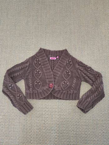 Boléro fille NKY , 8 ans , très bon état