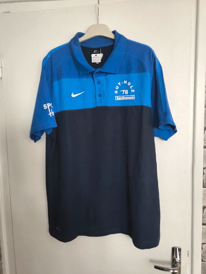 Polo bleu Nike taille L