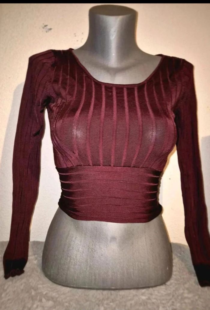Pull manche  longue mauve  Zara