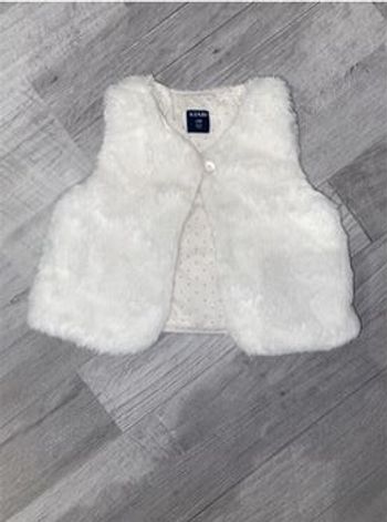 Gilet sans manches en fausse fourrure