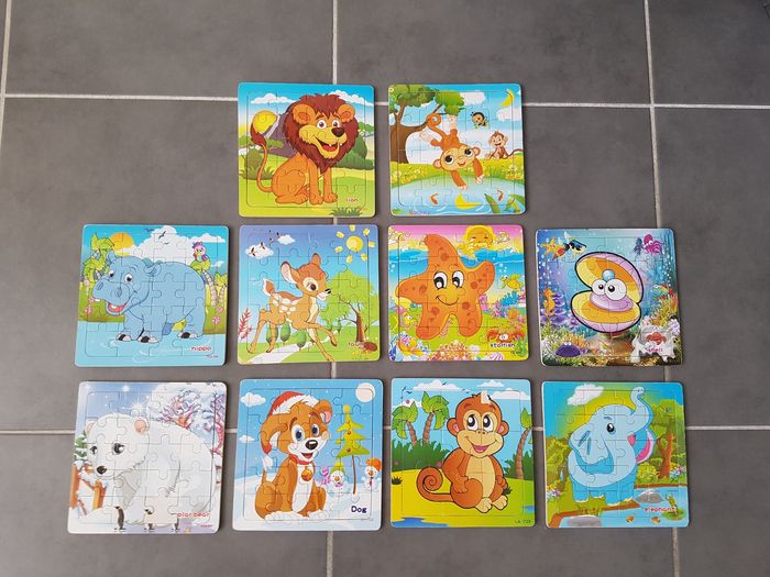 Lot de 10 puzzles en bois, propres ( 7 en très bon état, 3 en bon état), très propres