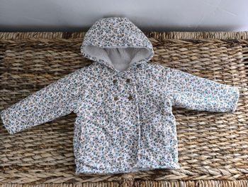 Manteau réversible obaïbi taille 12 mois