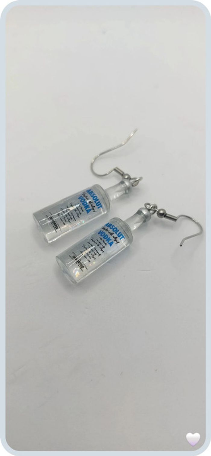 magnifique paire de boucles d oreilles absolut vodka