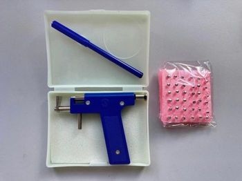 Kit piercing + 48 puces d oreillers neuf