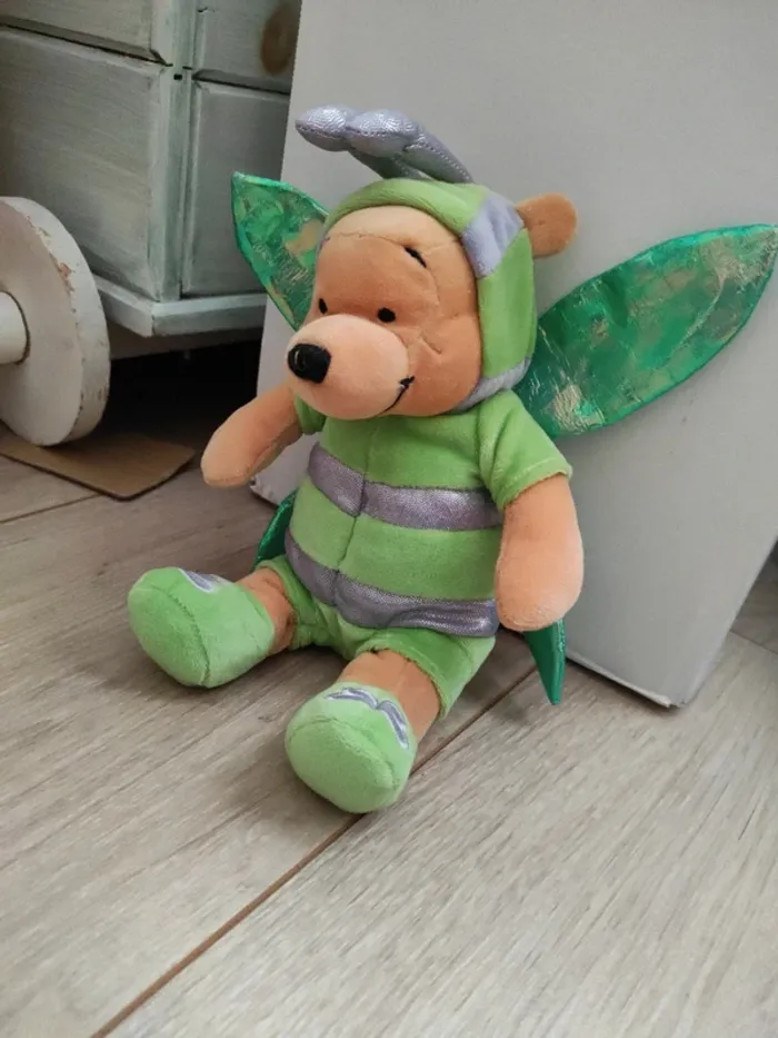 Winnie papillon vert