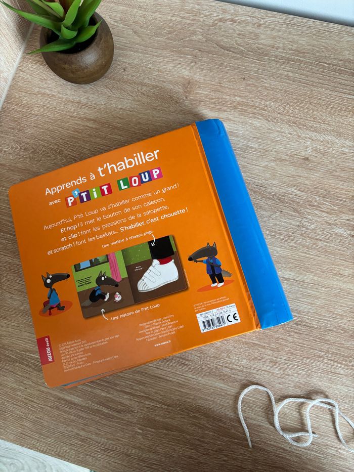 Livre apprends à t’habiller avec p’tit loup Auzou éveil - photo numéro 7