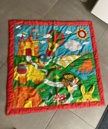 Tapis d’éveil avec jouets