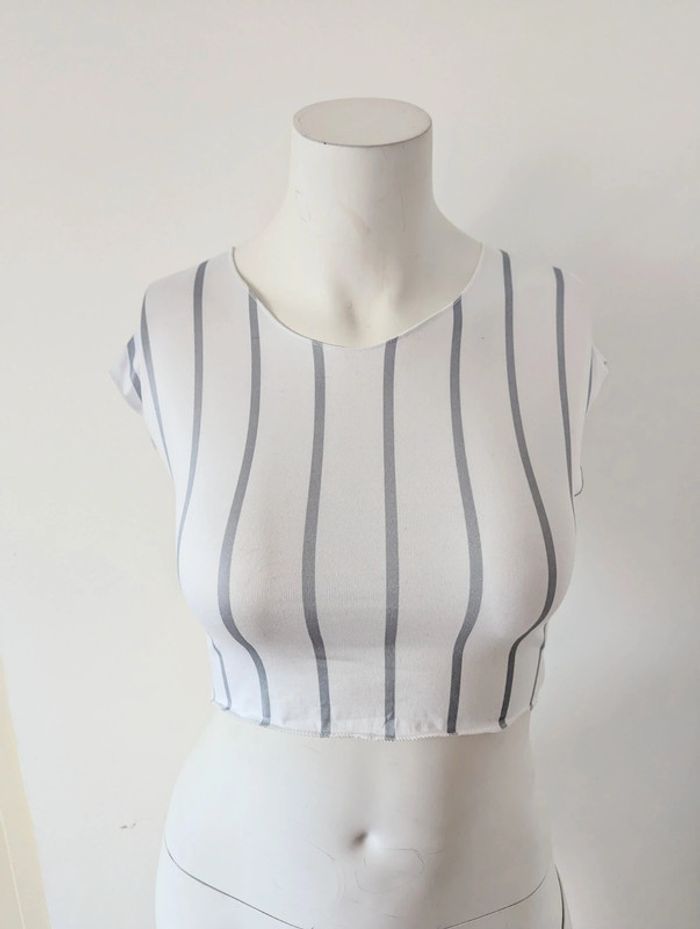 Top court sans manches a rayures taille l 40