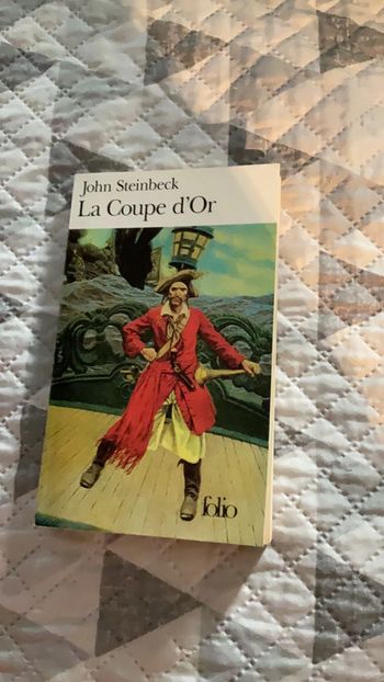 # la coupe d’or John Steinbeck.        )