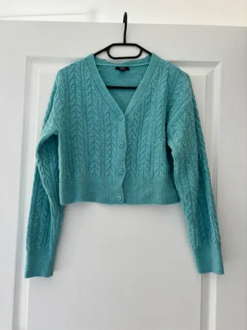 Gilet turquoise Kiabi