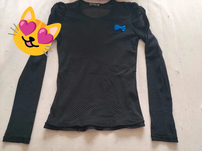 Pull fin noir jeux câlins 14 ans