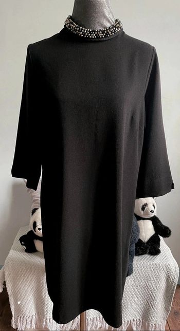 Très élégante robe droite noir Peacocks.