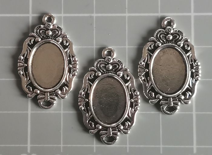 3 x pendentifs supports cabochons PF ornementés ovales en métal argenté - photo numéro 2