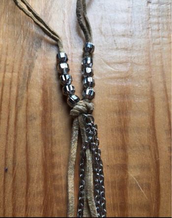 Collier bohème pampilles plume et piécettes
